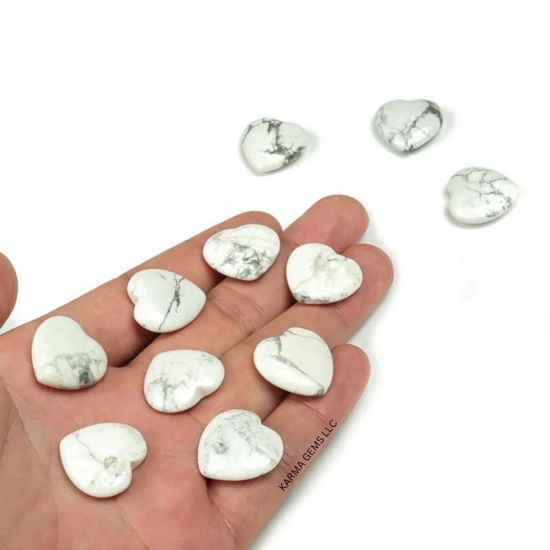 Karma Gems Howlite heart puff stone used in a desktop crystal grid setup.