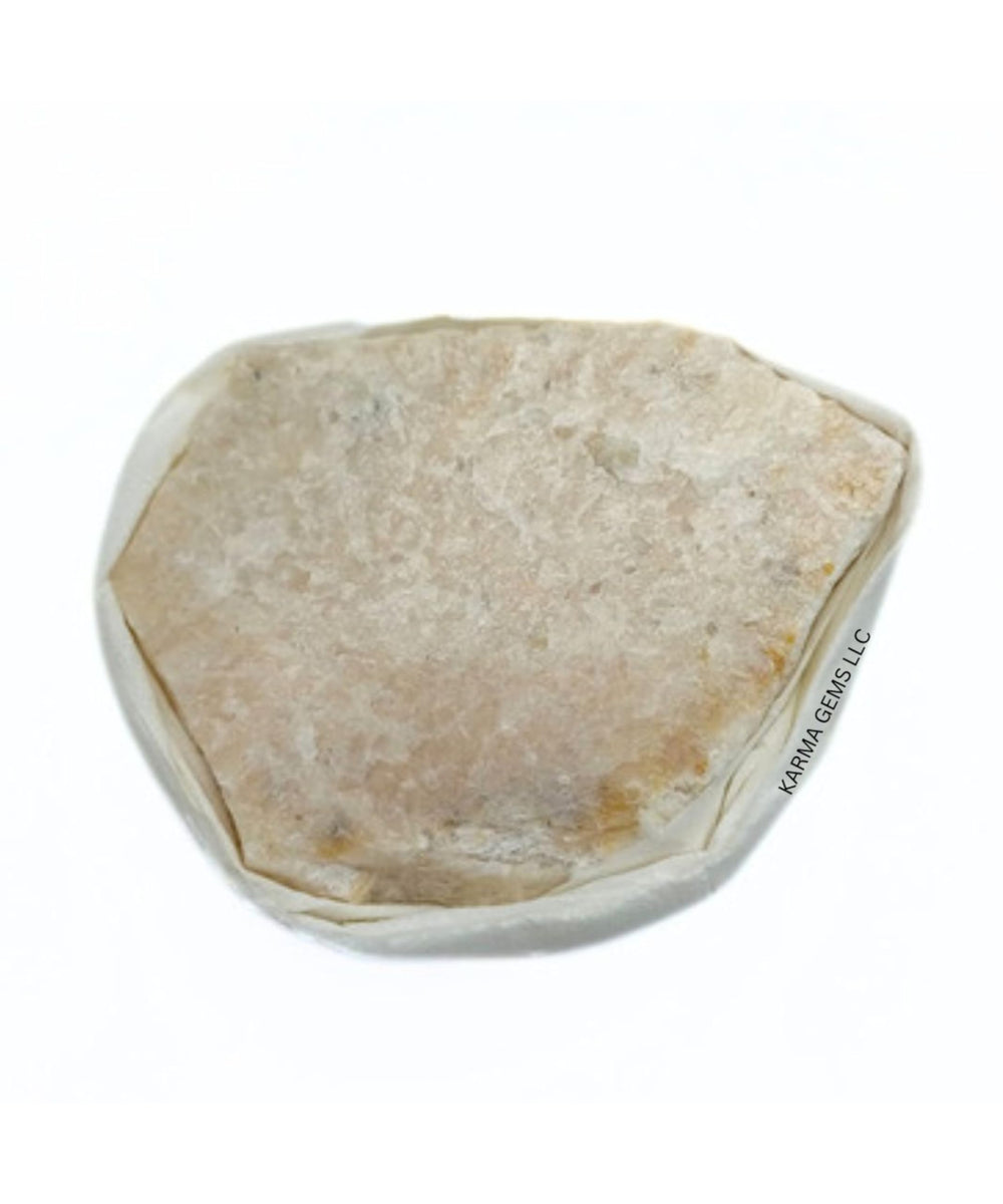 Karma Gems Peach Moonstone flat stone close-up for meditation balance.