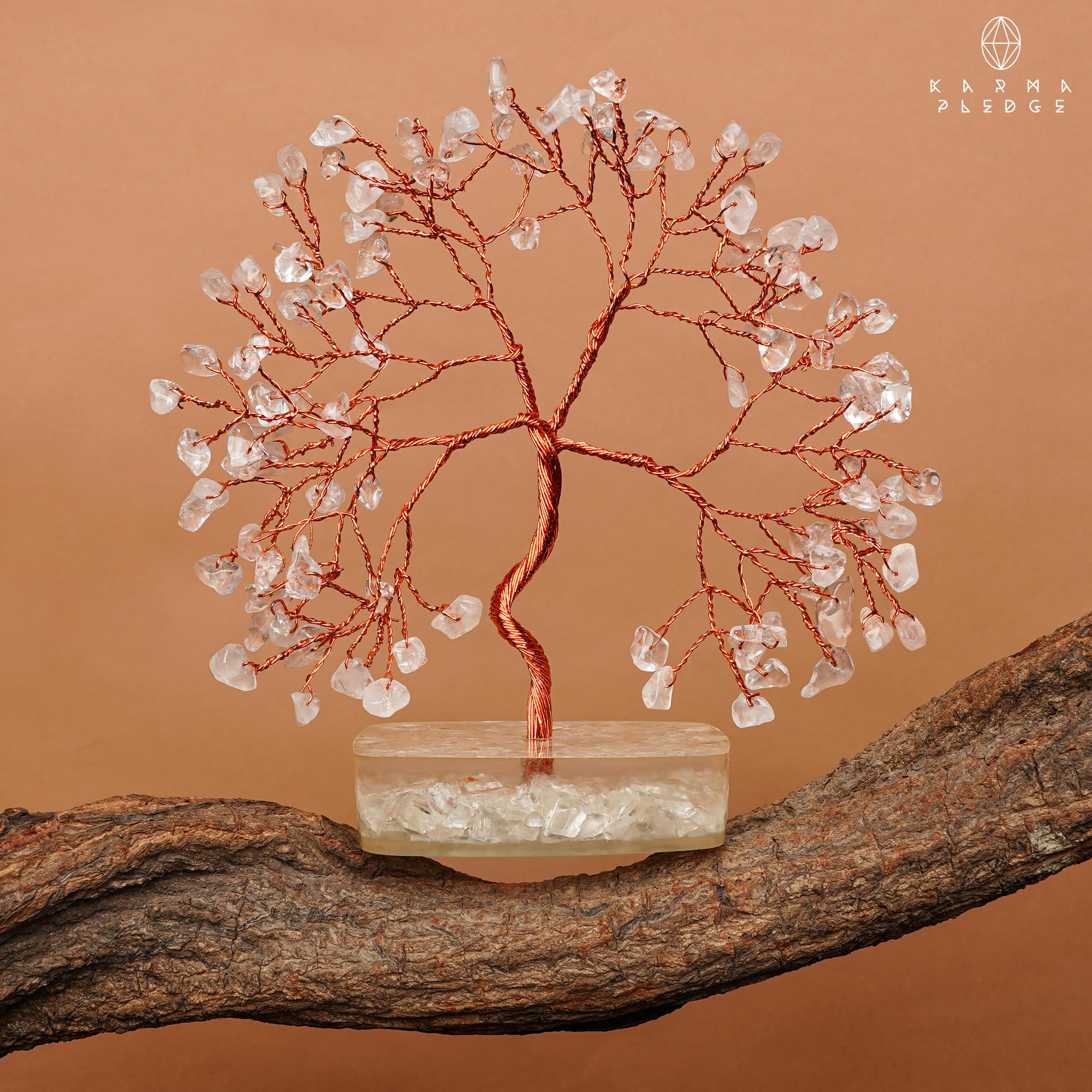 KARMAPLEDGE Clear Quartz Tree shows natural variations in crystals.