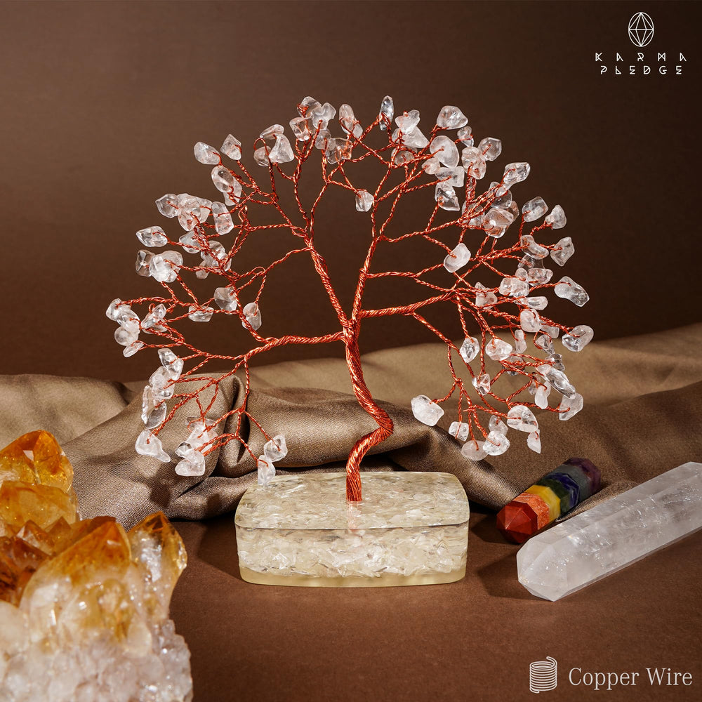 KARMAPLEDGE Clear Quartz Tree on office desk, focal point for focus.