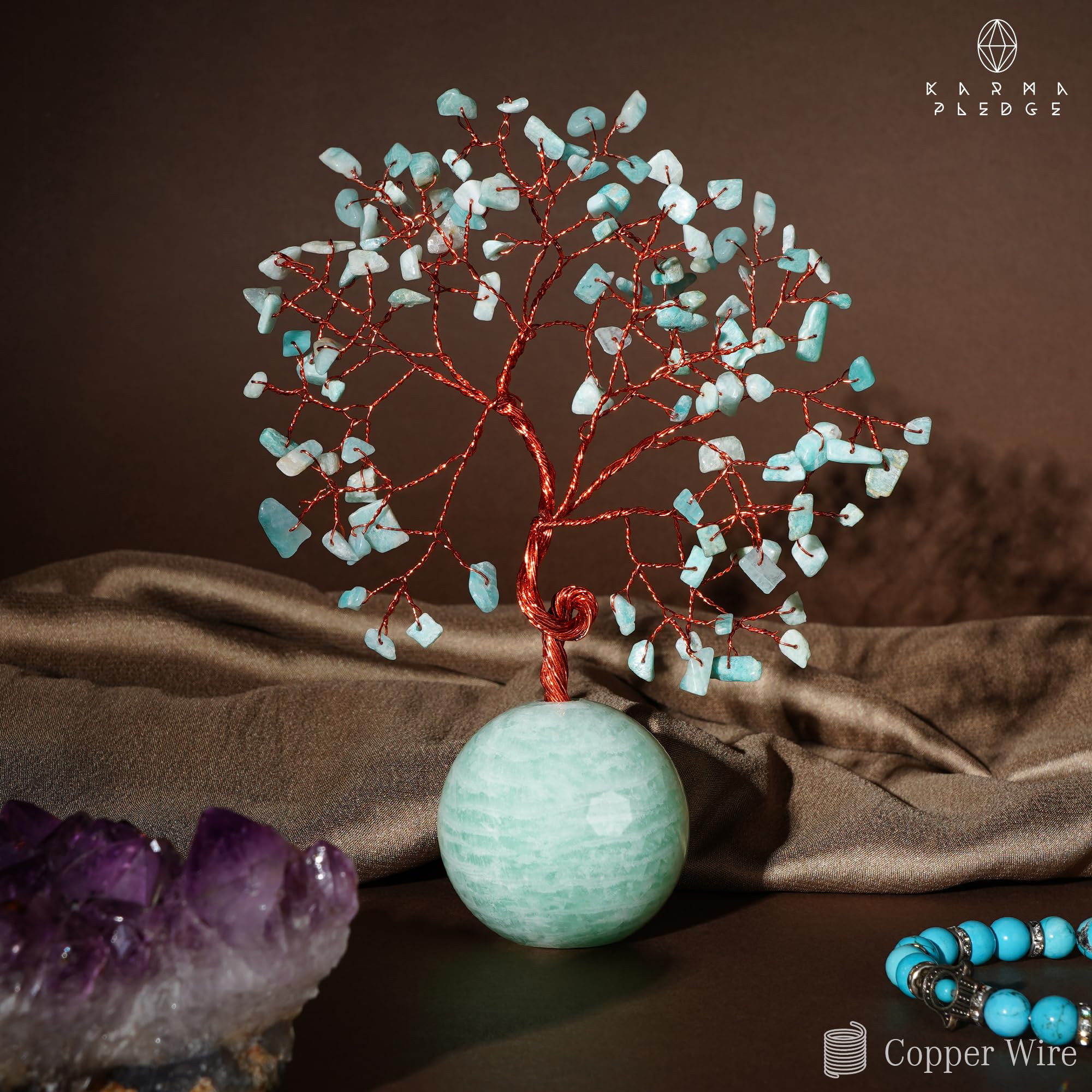 KARMAPLEDGE 100 crystal beads sparkle, enhancing visual interest and positivity