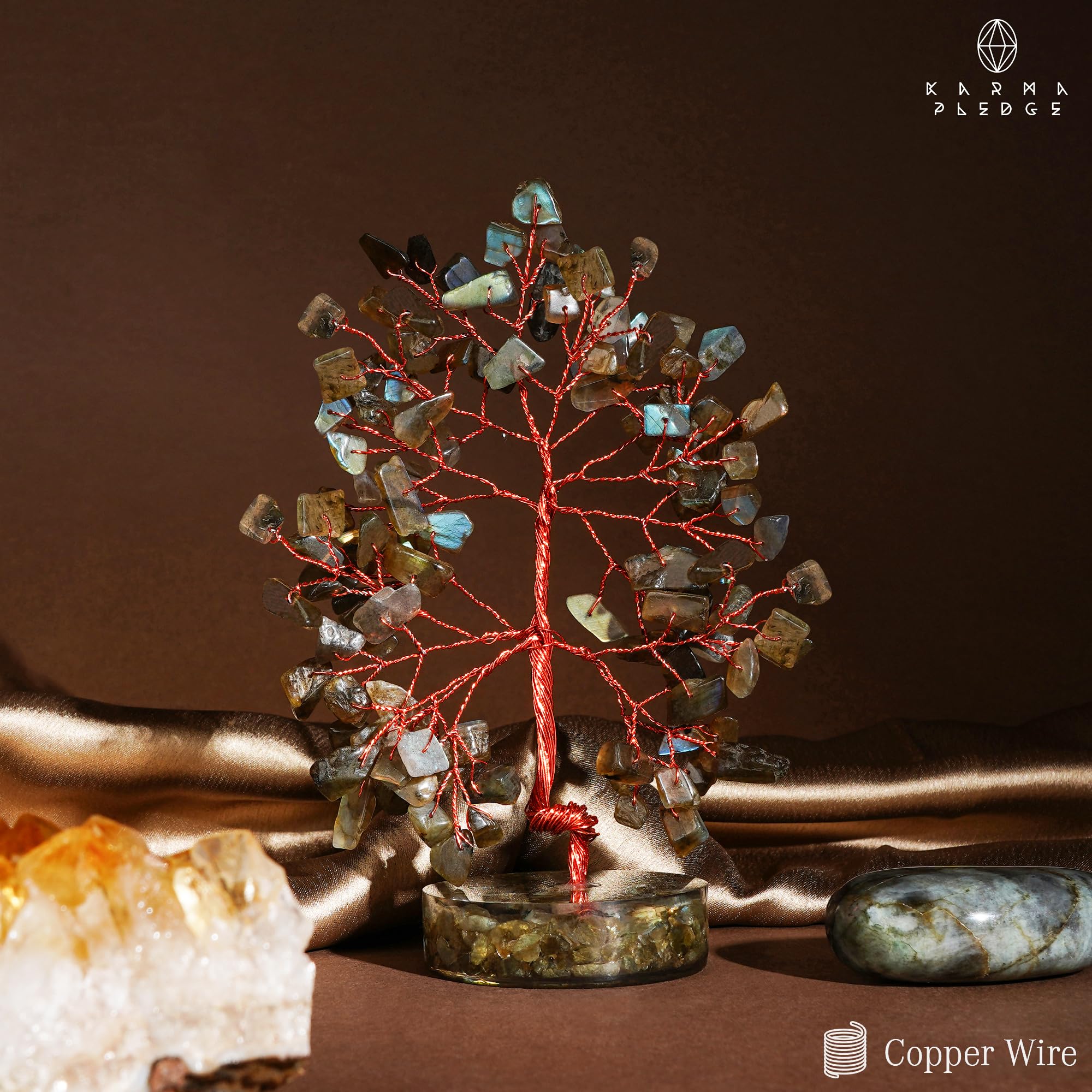 KARMAPLEDGE handcrafted Indian crystal tree with 100 beads adds tactile sparkle.