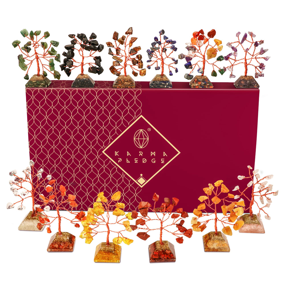 KARMAPLEDGE crystal tree of life with root chakra stones for grounding on a desk