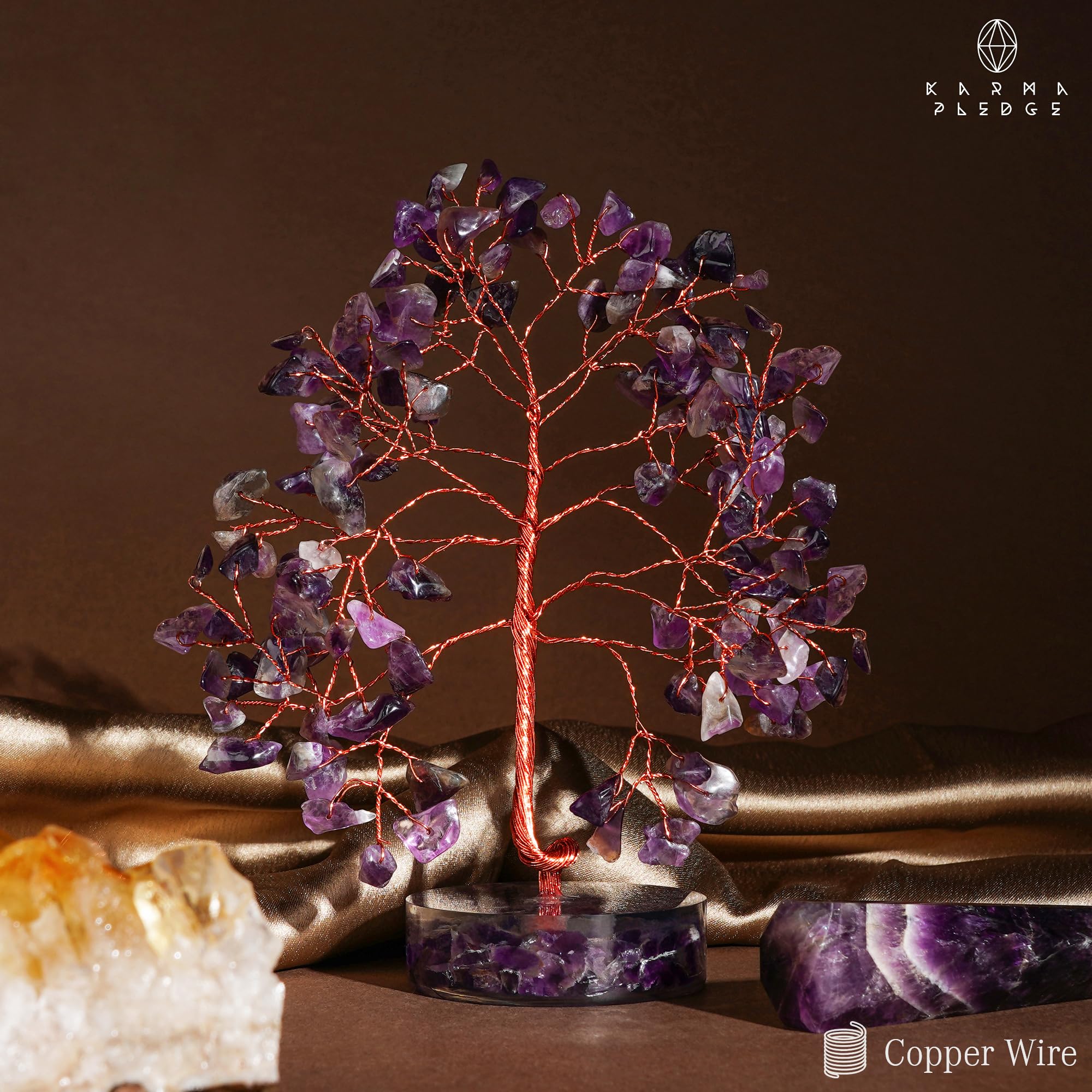 KARMAPLEDGE Crystal Tree base anchors grounding vibes with orgone-inspired design.