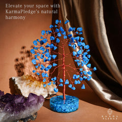 KARMAPLEDGE crystal tree orgone base anchors energy and stability on a table.