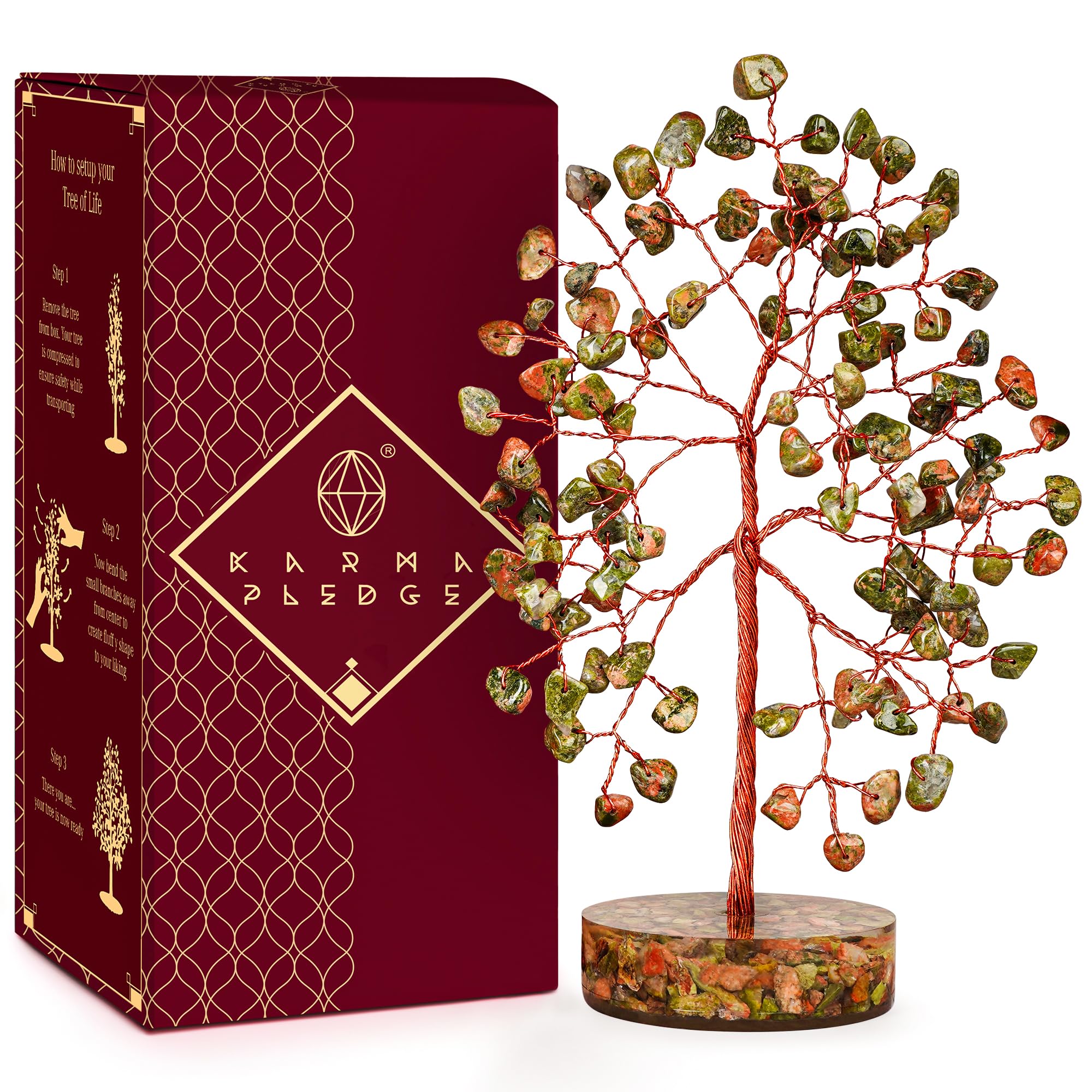 KARMAPLEDGE crystal tree with unakite chakra stones to promote calm on a desk.