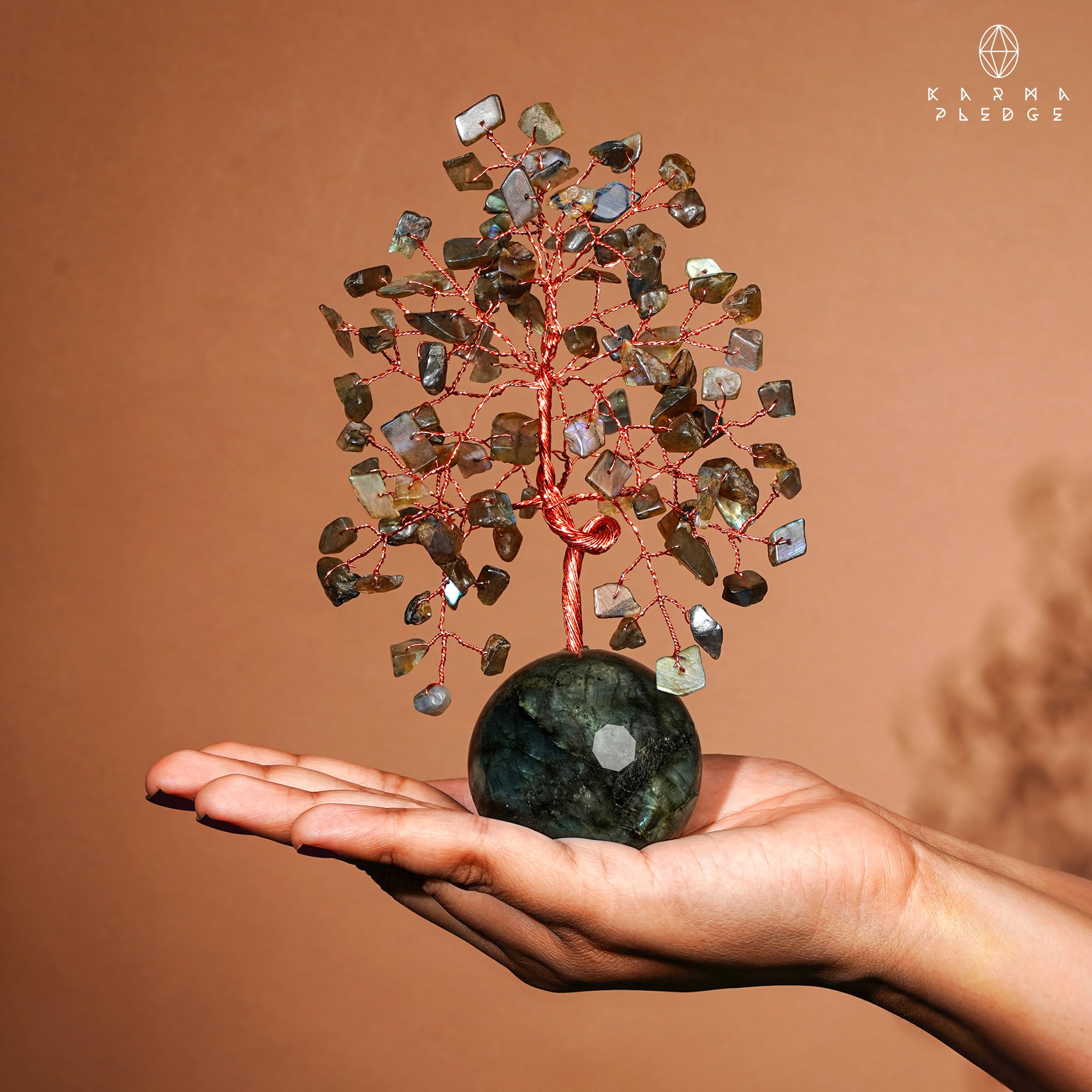 KARMAPLEDGE Handmade in India, each tree is uniquely crafted.