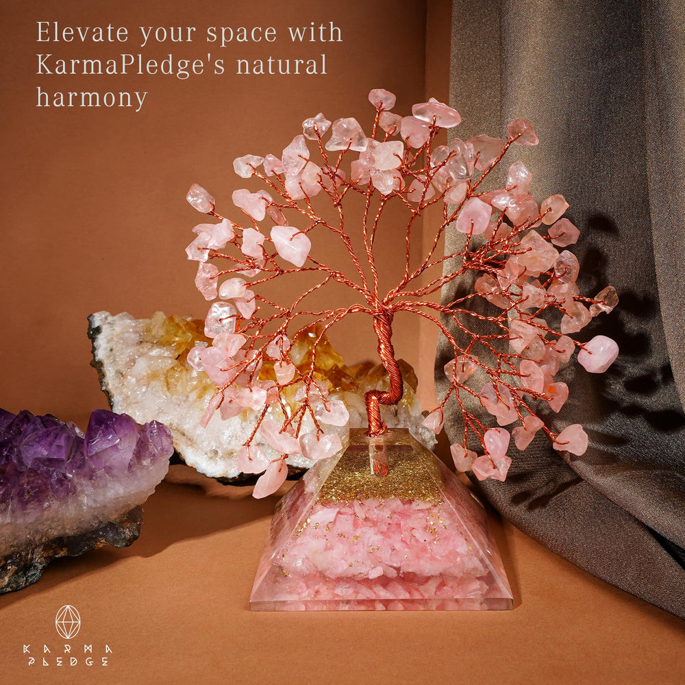 KARMAPLEDGE Rose Quartz Crystal Tree on an agate base enhances office decor.