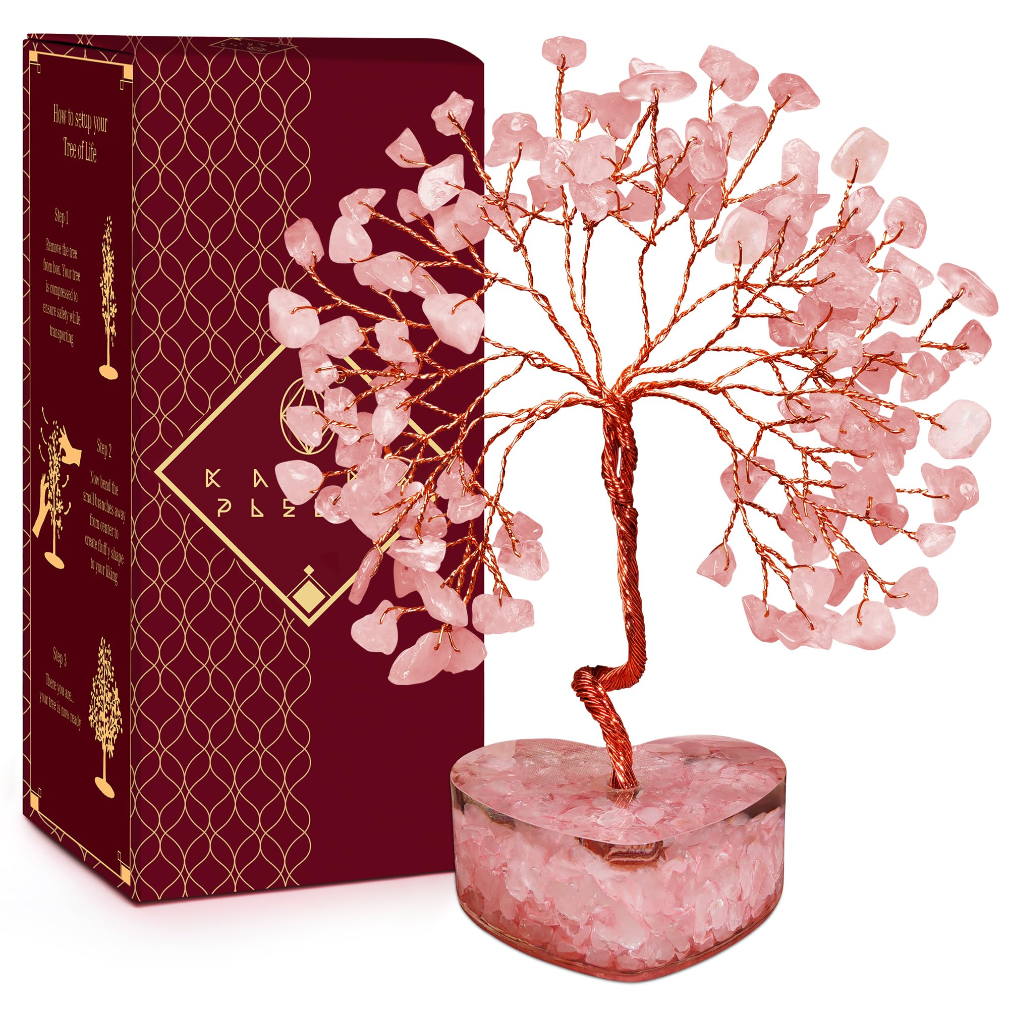 KARMAPLEDGE Rose Quartz Crystal Tree on a desk for calm energy and style.