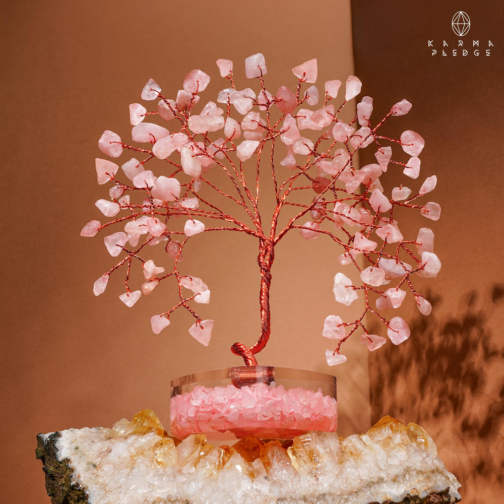 KARMAPLEDGE Rose Quartz Crystal Tree suited for meditation spaces.