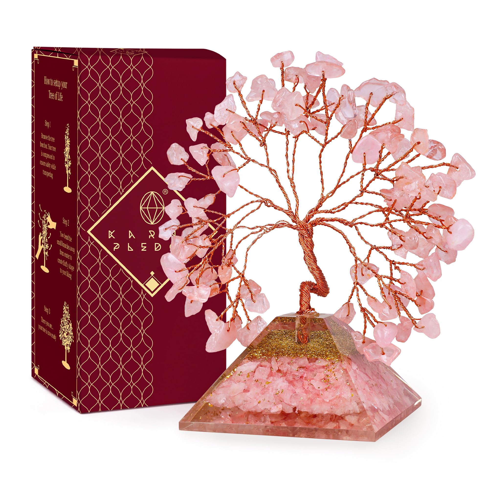 KARMAPLEDGE Rose Quartz Crystal Tree with pyramid base decorates desks with calming energy.