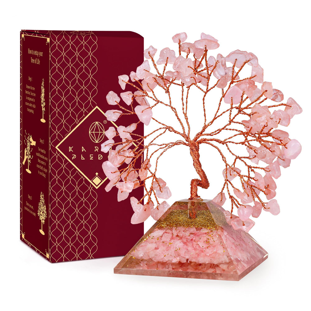 KARMAPLEDGE Rose Quartz Crystal Tree with pyramid base decorates desks with calming energy.