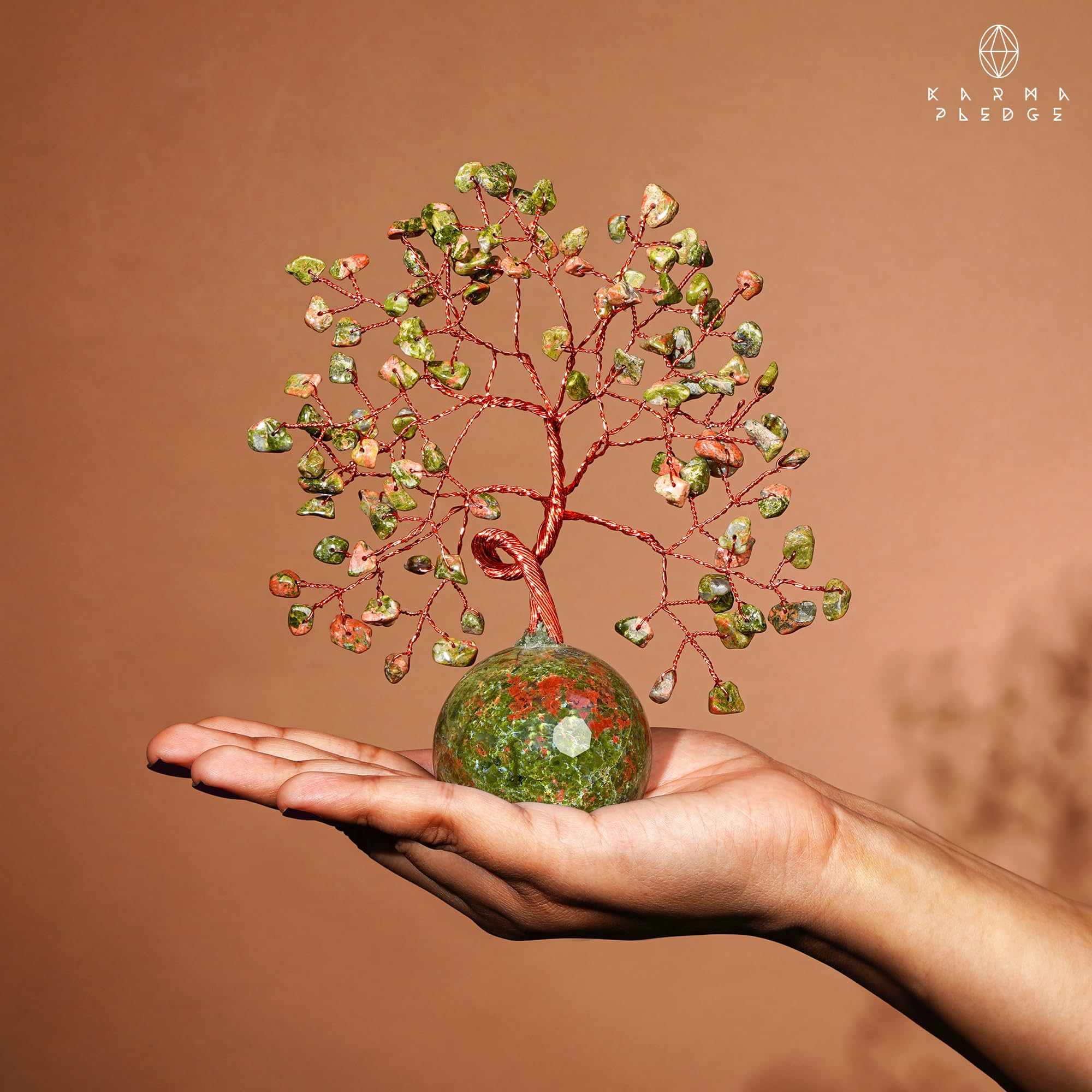 KARMAPLEDGE unakite chakra stones tree closeup highlights natural variations.