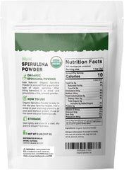 Kate Naturals Spirulina Powder pour bottle about to add to a glass for greens.