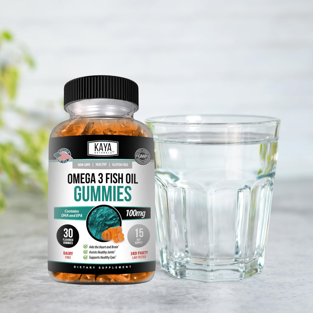 Gummy bottle held in hand by Kaya Naturals for on-the-go use.