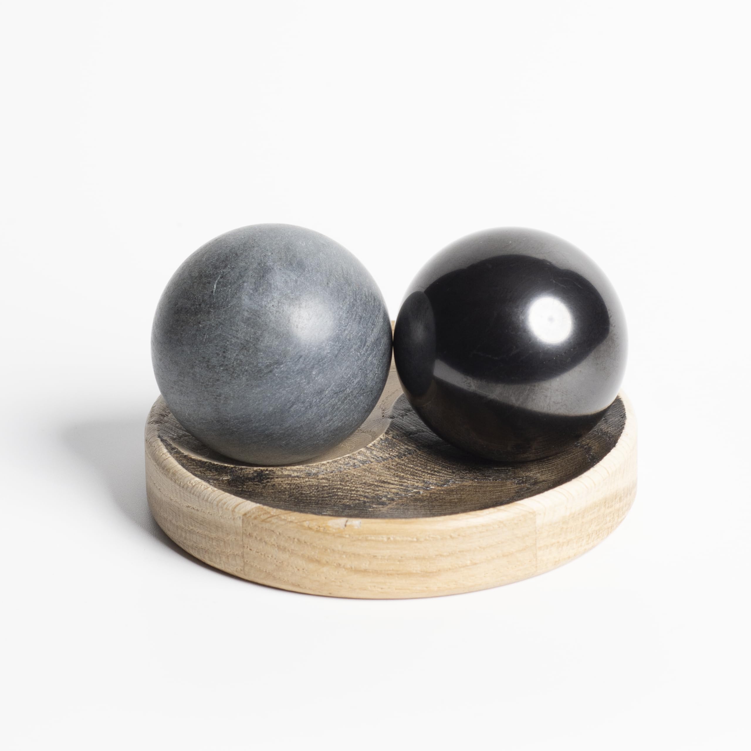 Keled Rocks shungite Yin Yang ball on oak stand for balanced mindful rotation