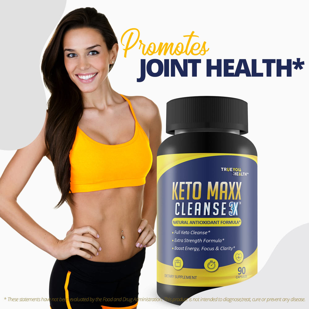 Keto Maxx Cleanse 3X glass of water with pills ready to take.