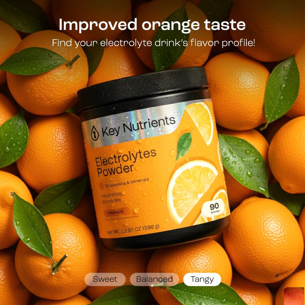 Athlete drinking KEY NUTRIENTS Tangy Orange during training.
