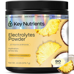 Key Nutrients tropical pineapple coconut electrolyte powder bottle on kitchen counter, calorie-free hydration