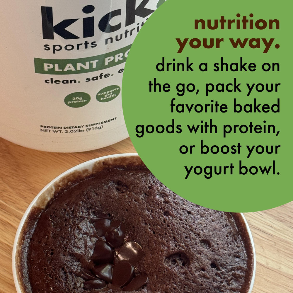 Kick Plant Protein Chocolate powder near a blender for quick mix.