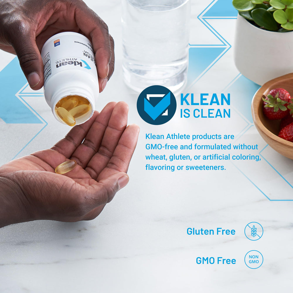 Klean Athlete Klean DHA softgels in hand suggesting daily omega-3 routine.