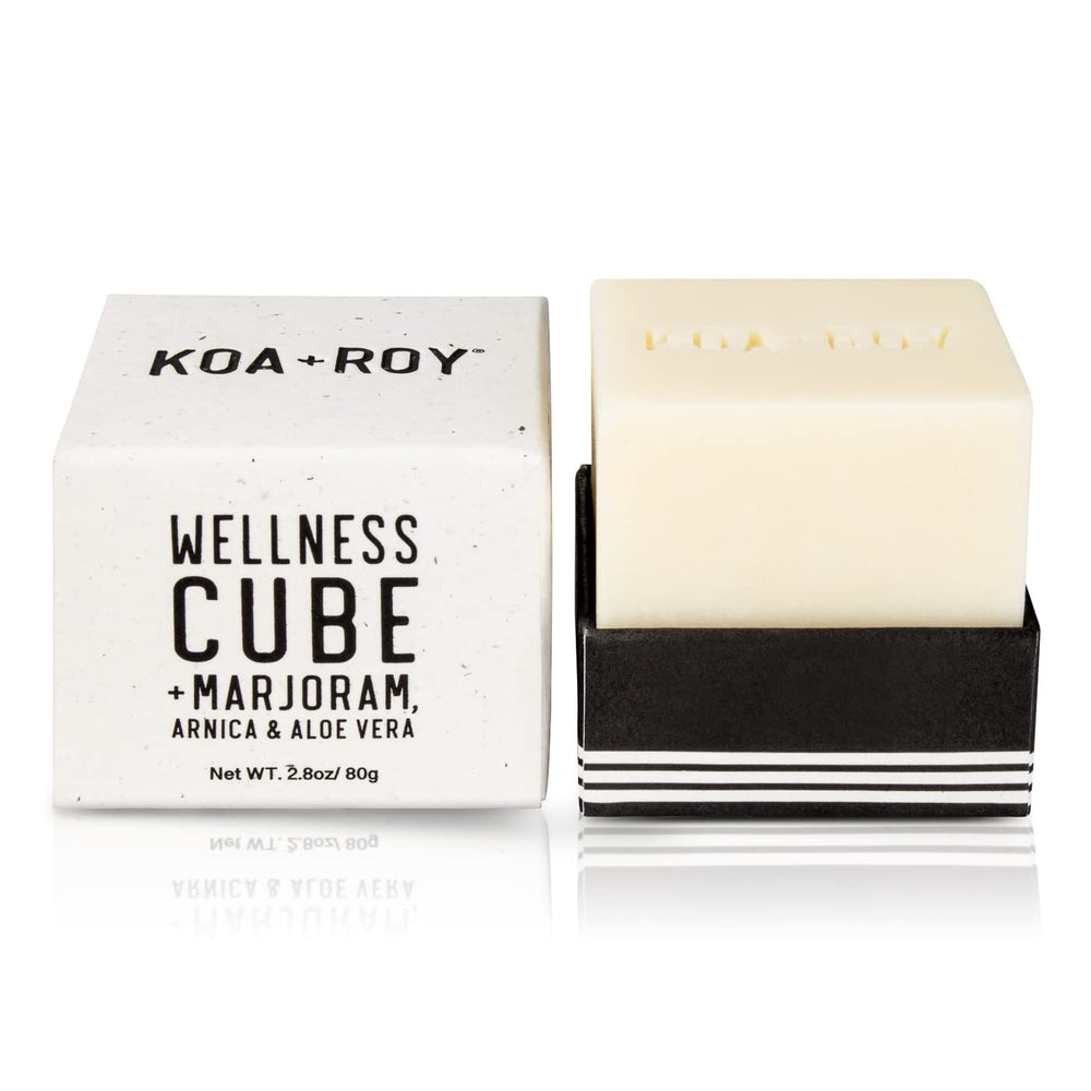 KOA ROY Wellness Cube bar being massaged to release oil.