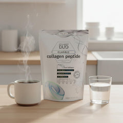 KOLLAGEN DUO collagen powder scoop showing precise serving for daily protein