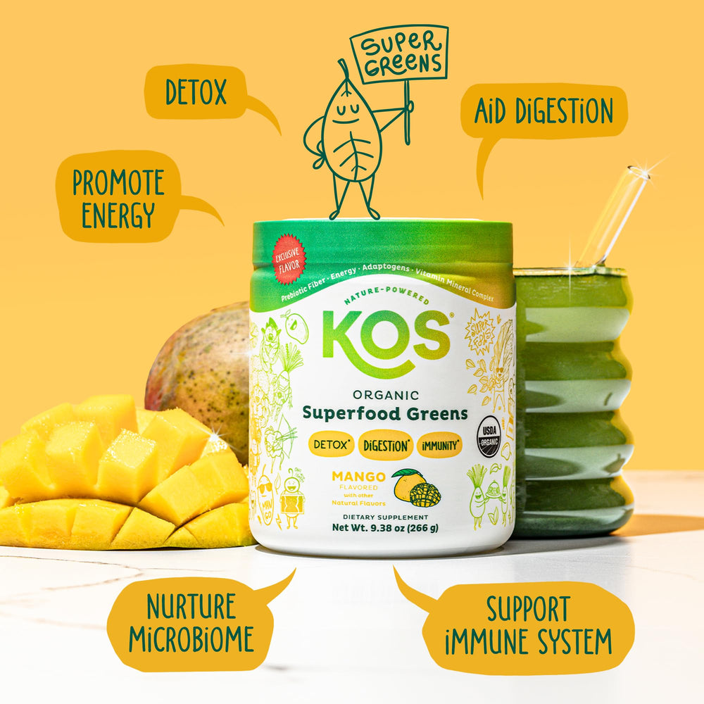 KOS Mango Greens Powder being poured into a tall glass for a refreshing drink.