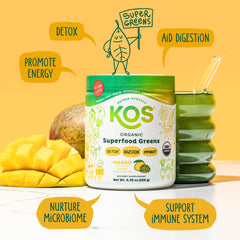KOS Mango Greens Powder being poured into a tall glass for a refreshing drink.