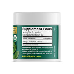 Kuli Kuli moringa capsules close-up showing vegetarian capsules