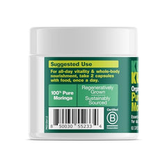 Kuli Kuli moringa capsules being poured for easy daily use
