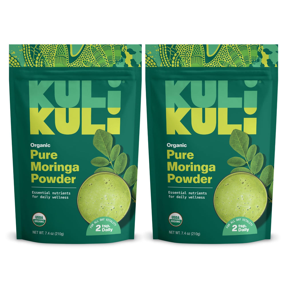 Kuli Kuli Moringa powder with a spoon for a greens boost.