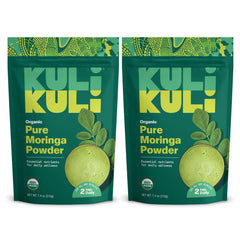 Kuli Kuli Moringa powder with a spoon for a greens boost.