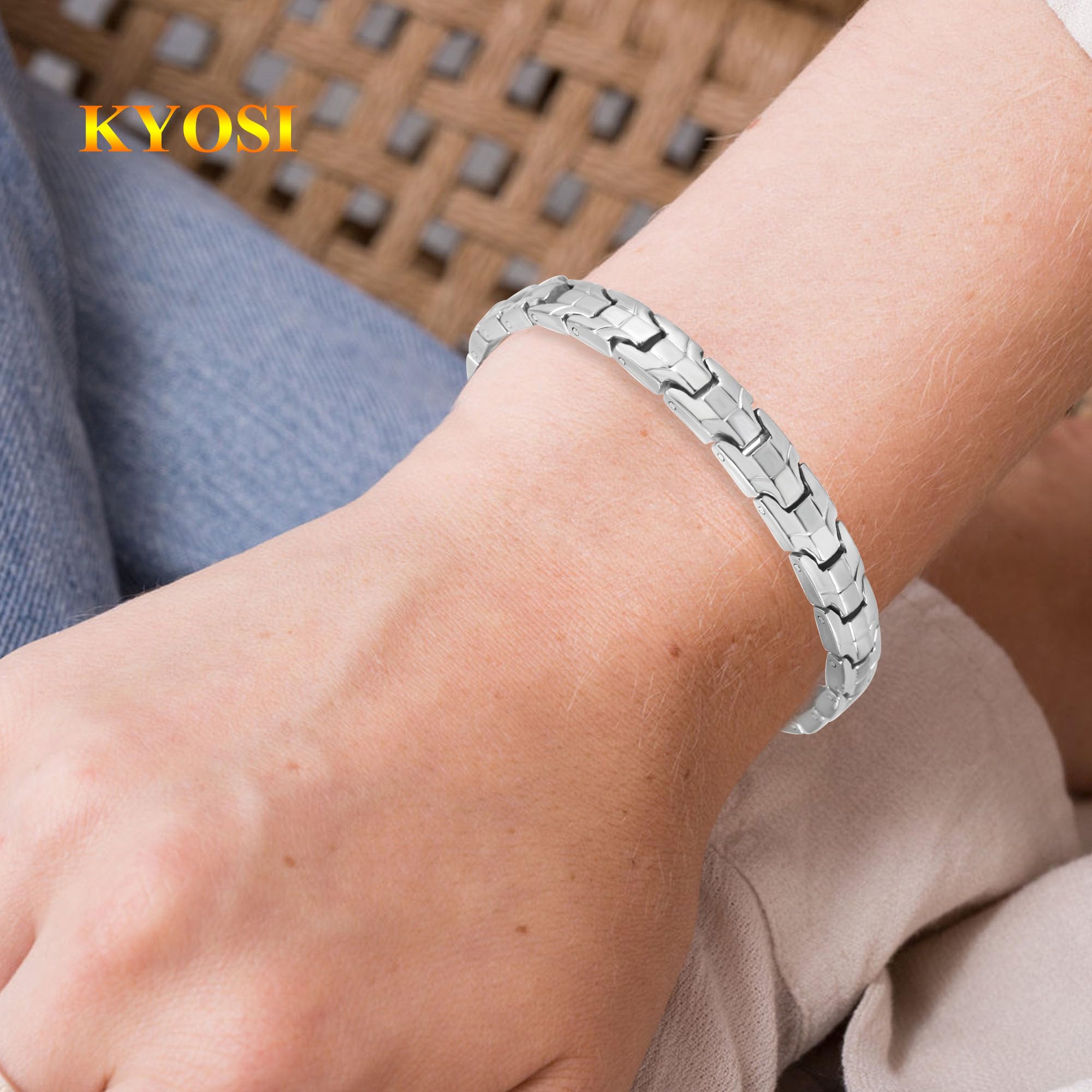 KYOSI close-up shows silver-tone titanium links and precise craftsmanship.