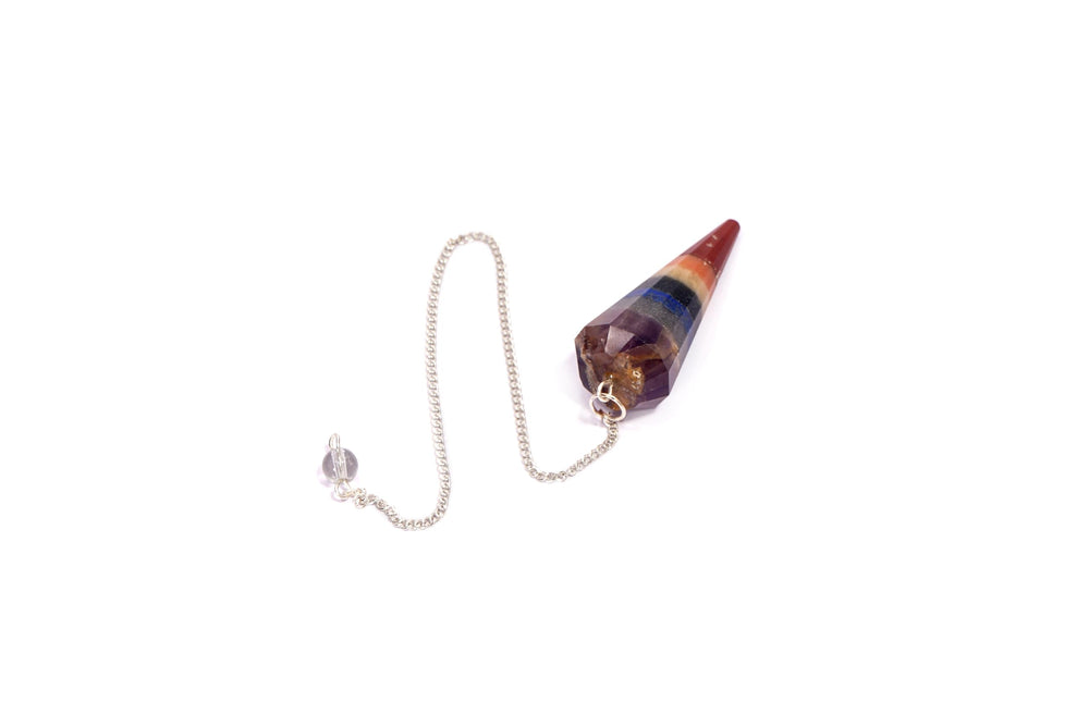 L Pedra Crystal pendulum shown during meditation sessions
