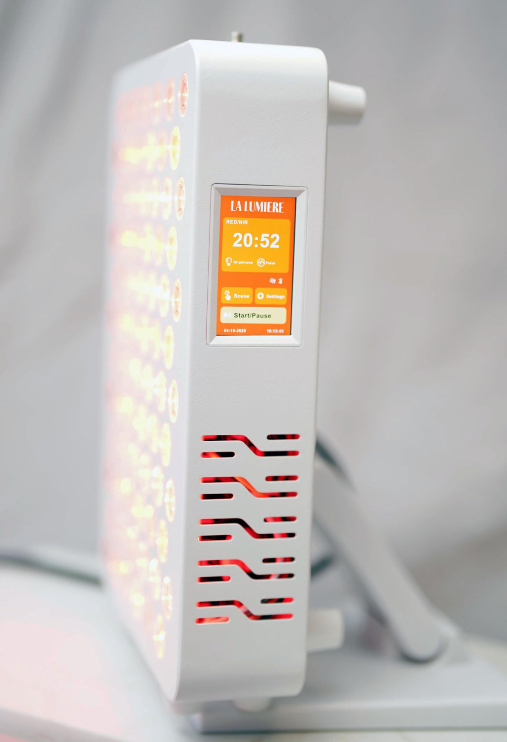 La Lumiere Therapy panel on stand adapts to your space for convenient use.