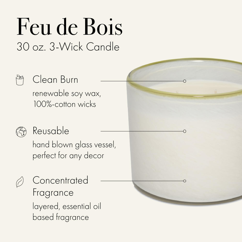 LAFCO New York Feu de Bois 3-Wick candle with reusable glass vessel enhances room ambiance.