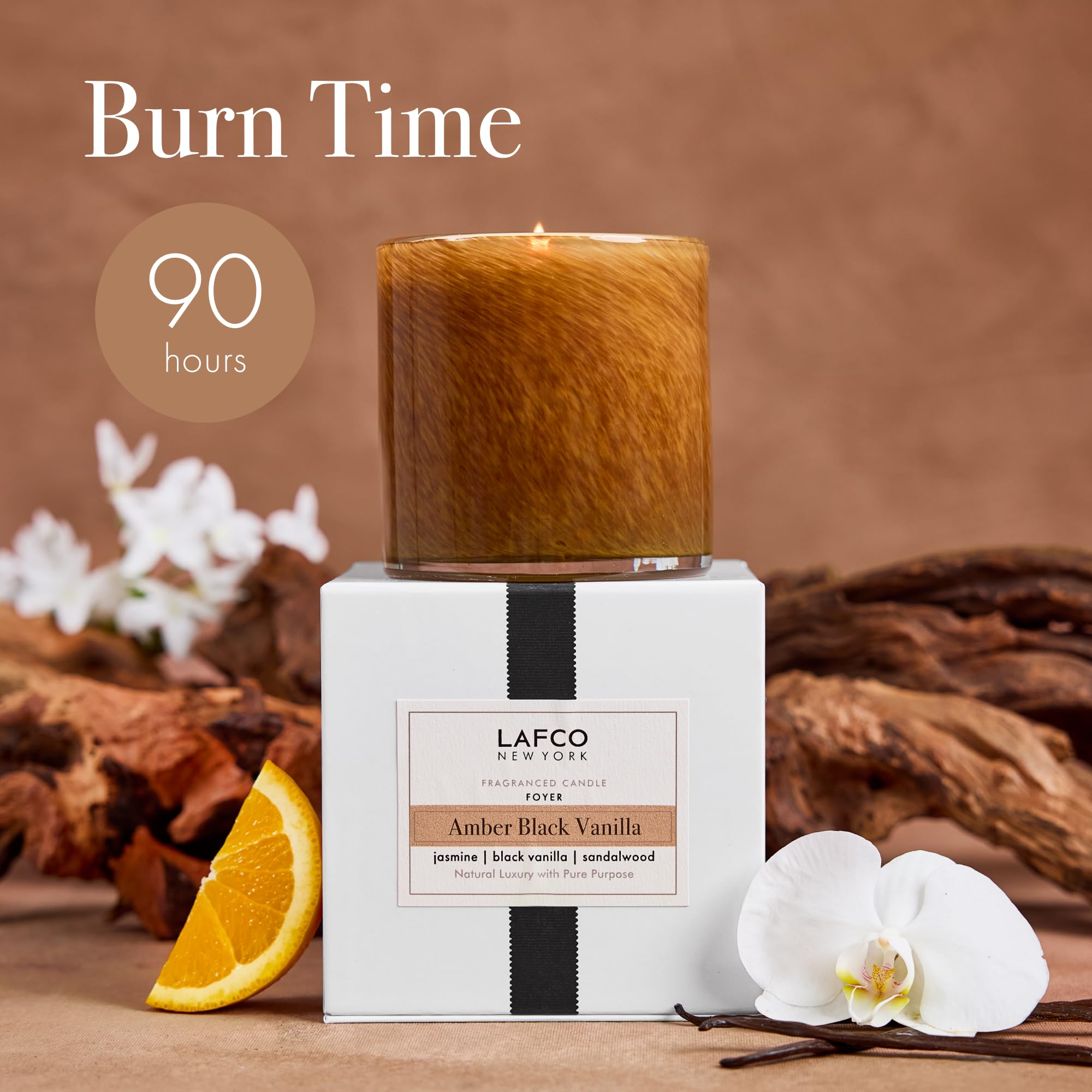 LAFCO New York Amber Black Vanilla candle flame provides a warm glow