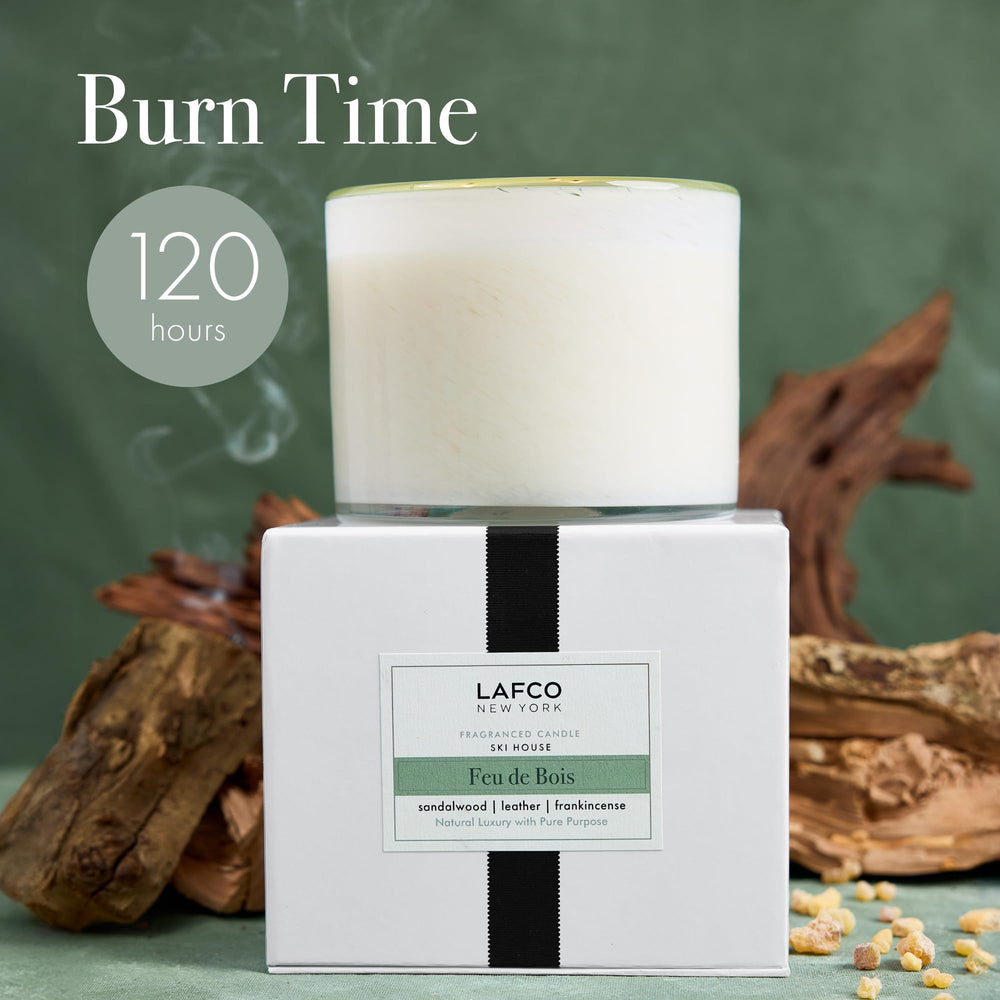 LAFCO New York Feu de Bois candle close up showing the glass vessel and wax clarity.