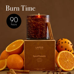 LAFCO New York hand-blown glass vessel with candle inside, showcasing artistry.