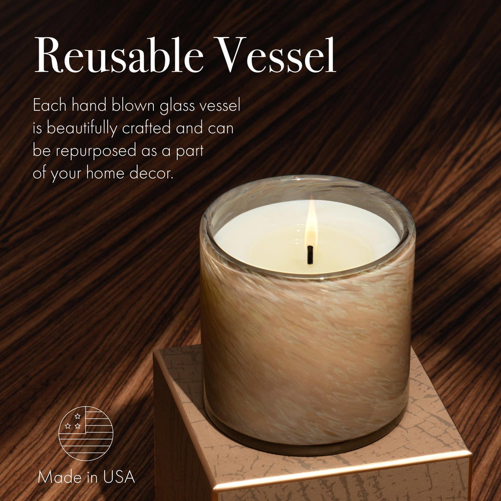LAFCO New York Holiday Signature Fall Candle reusable glass vessel doubles as decor.