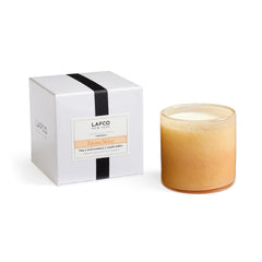 LAFCO New York Paloma Melon signature candle close-up on hand-blown glass vessel, enhancing ambient decor.
