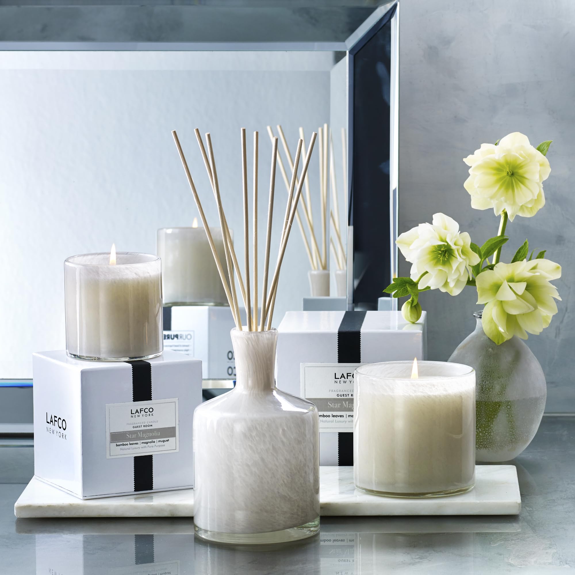 Star Magnolia candle burning with a long, clean burn time.