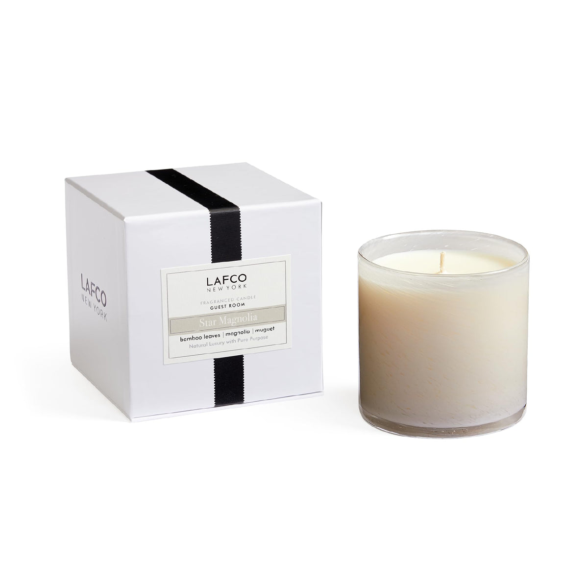 LAFCO New York Star Magnolia candle in a hand-blown glass vessel for ambient evenings.