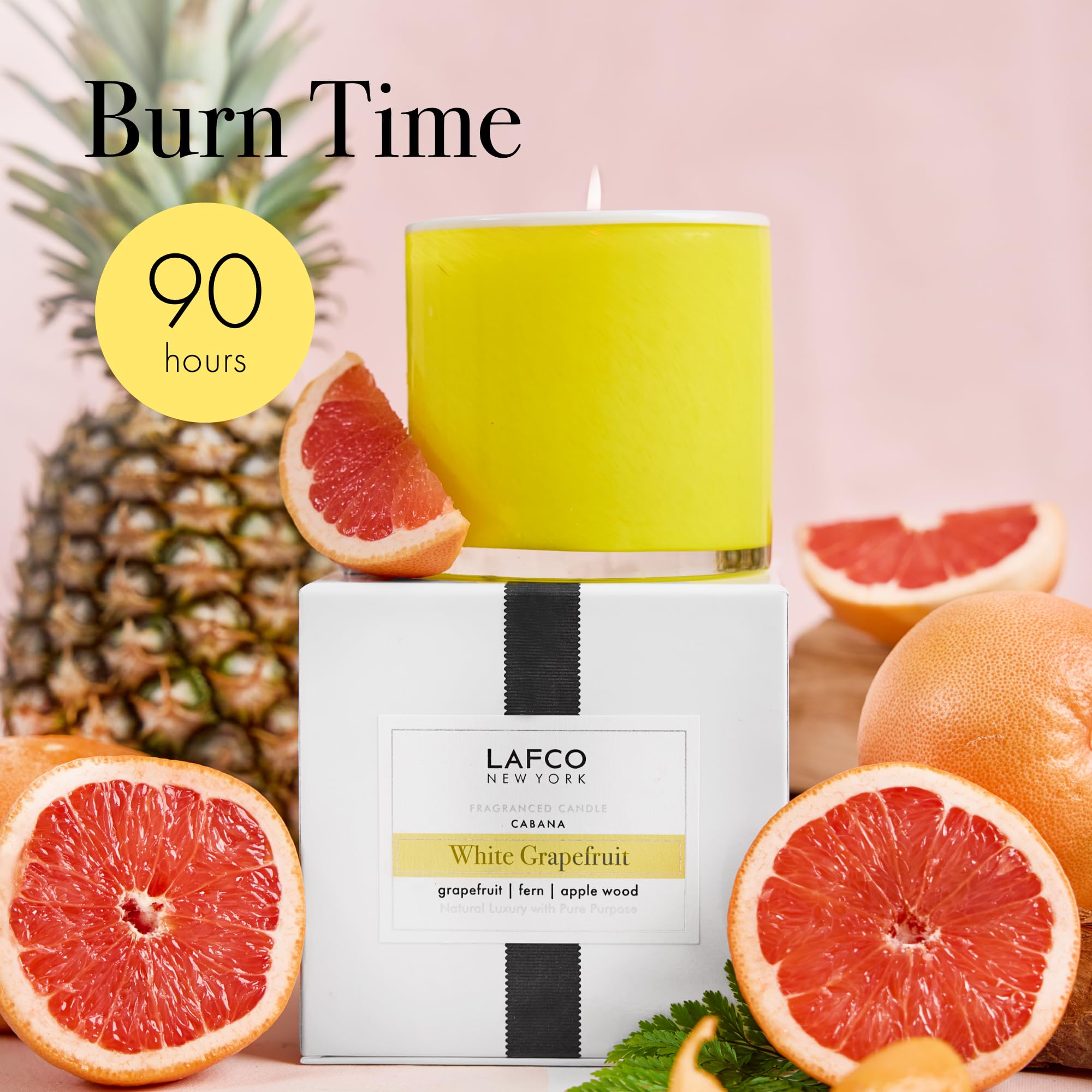 Unlit candle ready to elevate entryway with refreshing grapefruit scent.