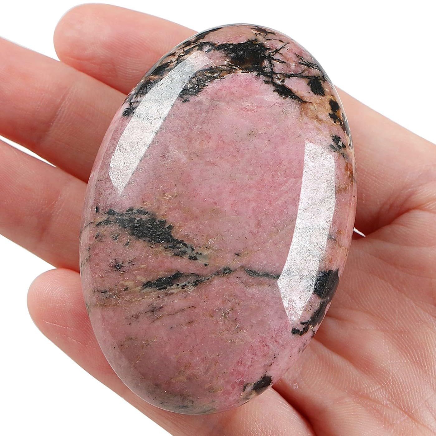 LAIDANLA Rhodonite palm stone close-up shows smooth polish