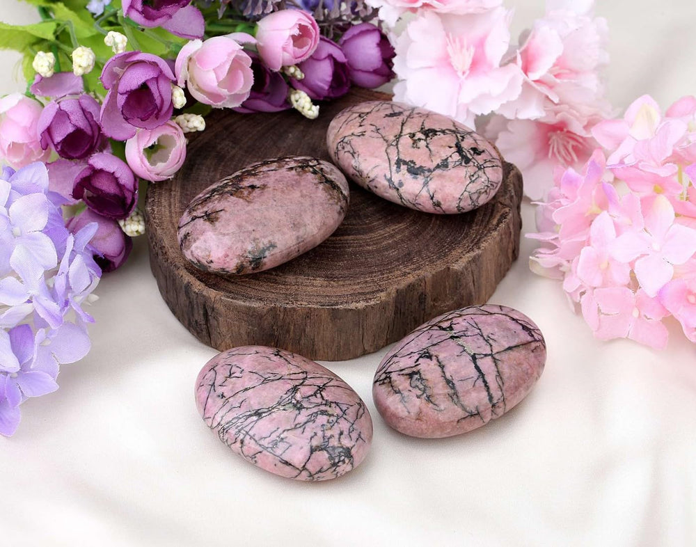 LAIDANLA Rhodonite palm stone in hand supports emotional balance