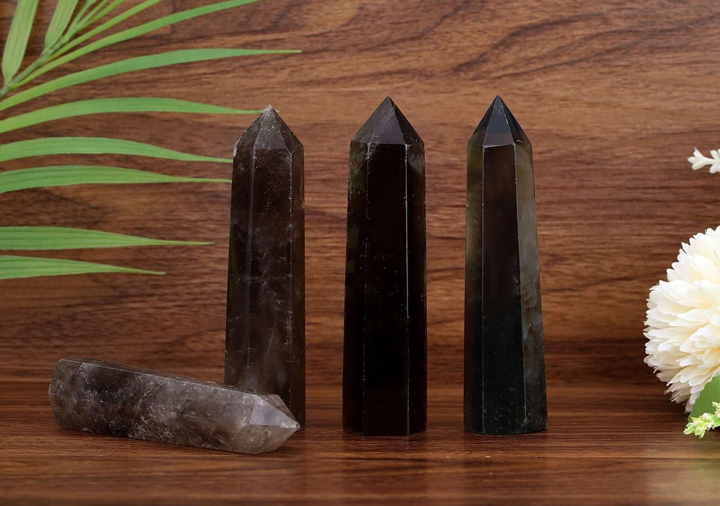 LAIDANLA Smoky Quartz wand in hand showing size and grip for chakras