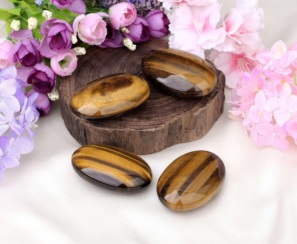 Laidanla Tiger's Eye palm stone with glossy finish supporting relaxation