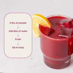 Laird Superfood Antioxidant Daily Reds being poured into a glass for refreshment.